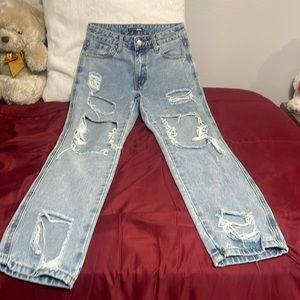I’m selling these light blue wash jeans